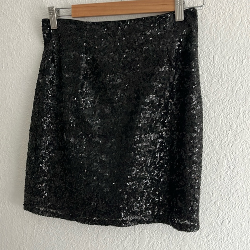 black sequins mini skirt